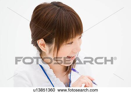 Stock Image - A young woman talking. Fotosearch