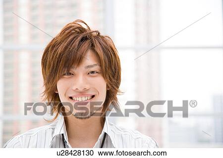 Stock Image - Portrait of young man. Fotosearch