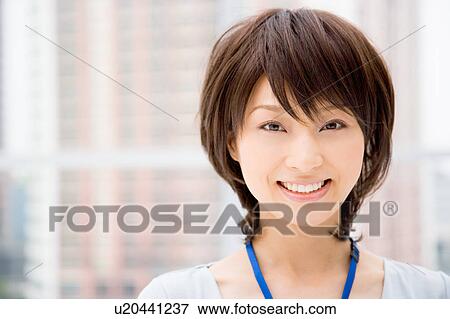 Portrait of young woman View Large Photo Image Stock Photo - Portrait of young woman. Fotosearch