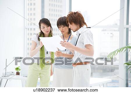 Three people talking View Large Photo Image Stock Photo - Three people talking. Fotosearch