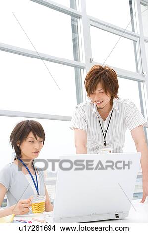 Young woman and man discussing View Large Photo Image Picture - Young woman and man discussing. Fotosearch