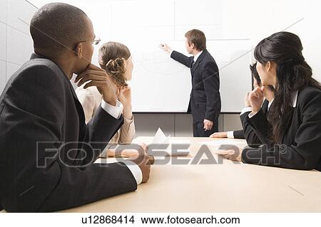 Business people having meeting View Large Photo Image Picture - Business people having meeting. Fotosearch