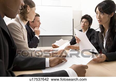 Business people having meeting View Large Photo Image Stock Image - Business people having meeting. Fotosearch