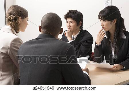 Business people having meeting View Large Photo Image Stock Photo - Business people having meeting. Fotosearch