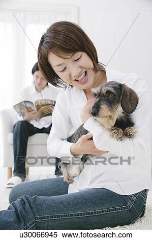 Young couple and Dachshund View Large Photo Image Stock Photography - Young couple and Dachshund. Fotosearch
