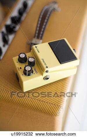 Stock Image - Amplifier and guitar effects pedal. Fotosearch