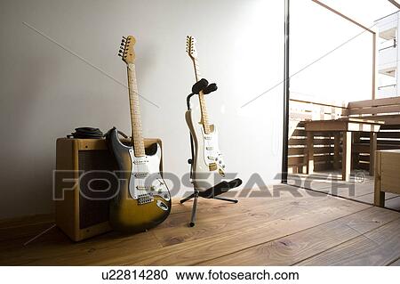 Electric guitars and amplifier View Large Photo Image Stock Image - Electric guitars and amplifier. Fotosearch
