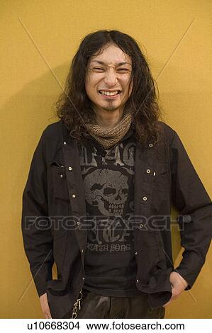 Picture - Young man smiling. Fotosearch