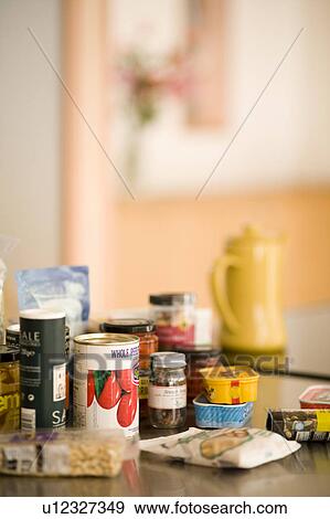 Stock Photo - Food items on kitchen counter. Fotosearch