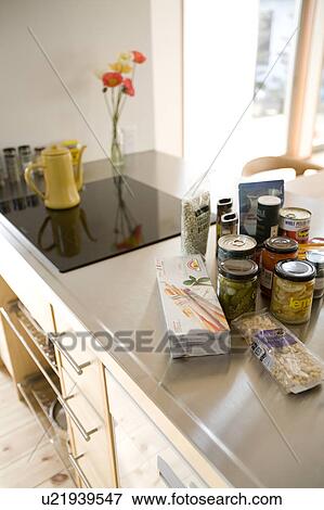 Stock Photo - Food items on kitchen counter. Fotosearch