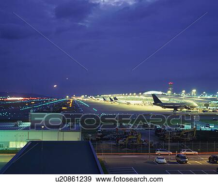 Airport at night, Japan View Large Photo Image Stock Photo - Airport at night, Japan. Fotosearch