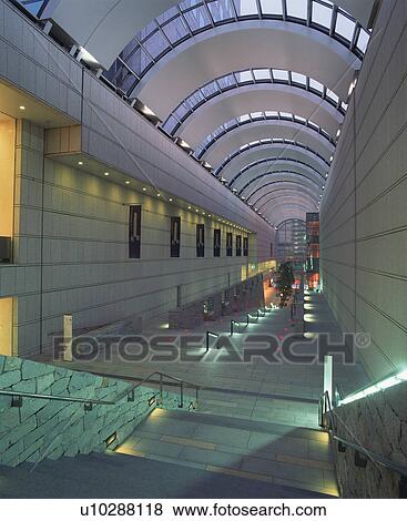Stock Photo - Arcade sidewalk at night, Tokyo, Japan. Fotosearch