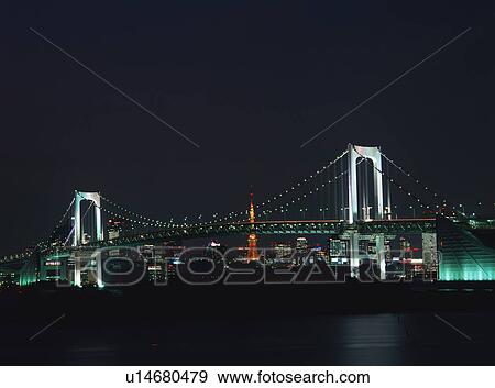 Stock Photo - Illuminated Rainbow Bridge, Tokyo, Japan. Fotosearch