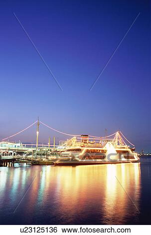 Stock Photograph - Illuminated ship in Yokohama port, Japan. Fotosearch