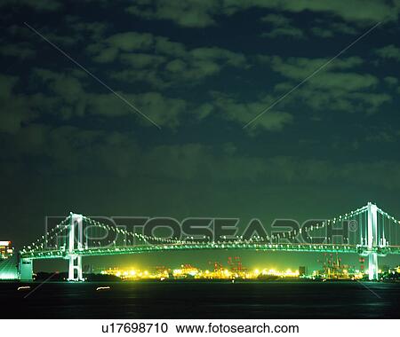 Rainbow bridge at night View Large Photo Image Stock Image - Rainbow bridge at night. Fotosearch
