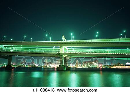 Rainbow bridge at night View Large Photo Image Stock Photo - Rainbow bridge at night. Fotosearch