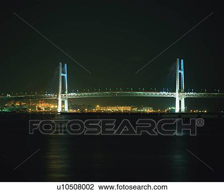 Stock Image - Yokohama Bay Bridge at Night. Fotosearch