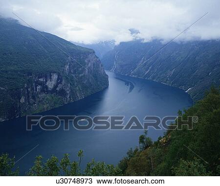 Stock Image - Aerial view of a fiord in Norway. Fotosearch