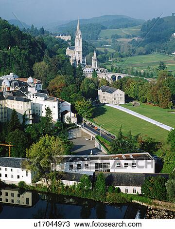 Stock Image - Aerial view of town in Lourdes, France. Fotosearch
