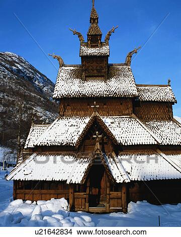 Picture - Exterior of a snow clad Borgund stavkirke church, Norway. Fotosearch