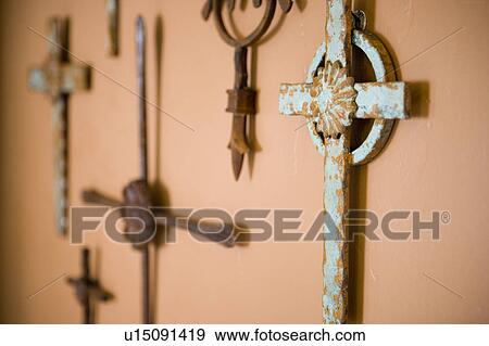 Stock Photo - Crosses Hanging on Wall. Fotosearch