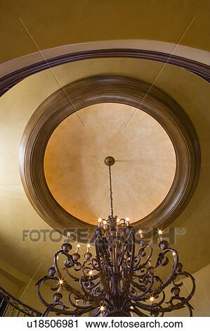 Stock Image - Elegant Chandelier and Ceiling Detail. Fotosearch