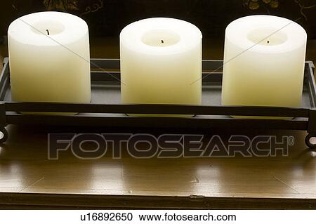 Group of three candles View Large Photo Image Stock Image - Group of three candles. Fotosearch