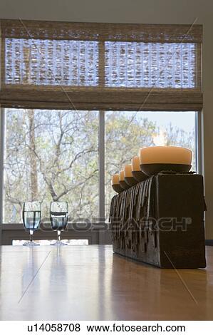 Stock Photo - Line of Candles on Dining Table. Fotosearch