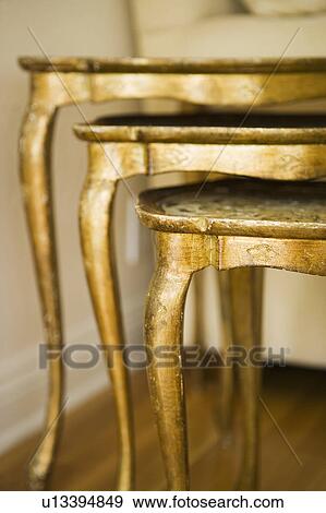 Stack of Gold Side Tables View Large Photo Image Stock Photo - Stack of Gold Side Tables. Fotosearch