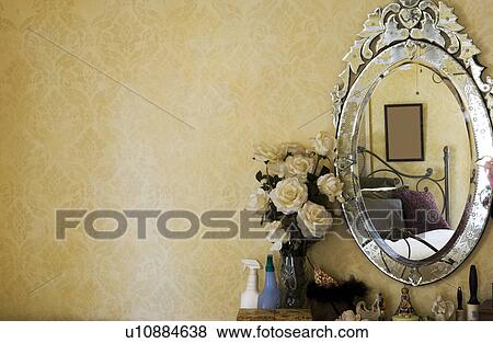 Stock Photo - Vignette of white roses next to antique vanity. Fotosearch