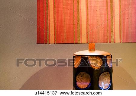 Stock Photo - Contemporary Bright Orange Lamp Shade. Fotosearch