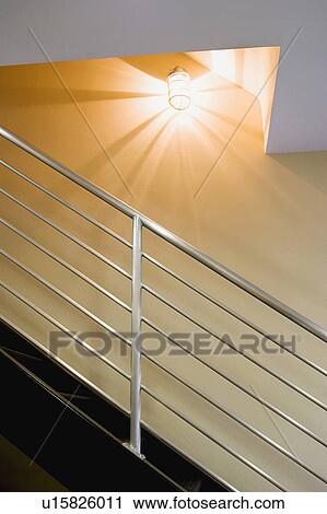 Stock Image - Contemporary metal staircase railing. Fotosearch