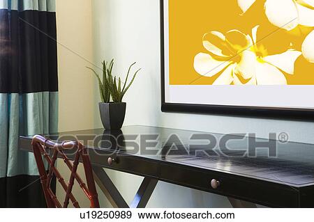 Stock Photo - Desk in contemporary home setting. Fotosearch