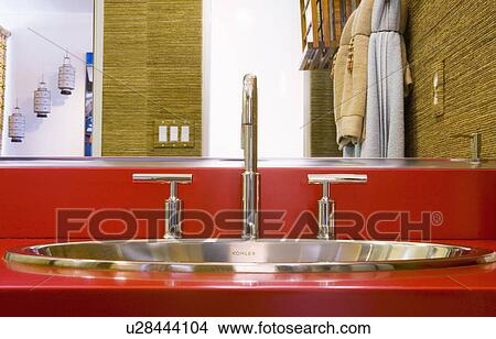 Metal sink on red countertop View Large Photo Image Picture - Metal sink on red countertop. Fotosearch