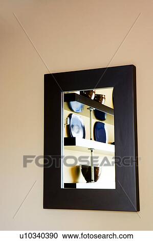 Stock Image - Reflection of dishes in mirror. Fotosearch