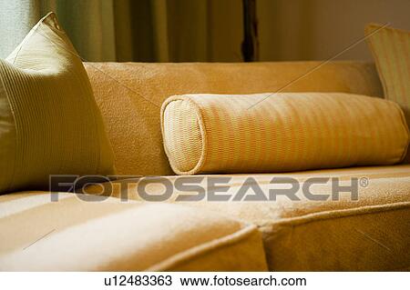Stock Image - Tan contemporary sofa. Fotosearch