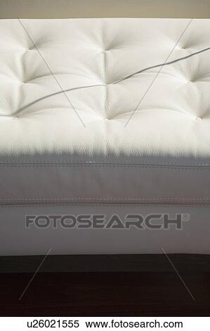 Stock Photography - White leather ottoman. Fotosearch