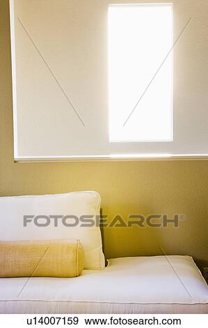 Stock Photo - White sofa and window. Fotosearch