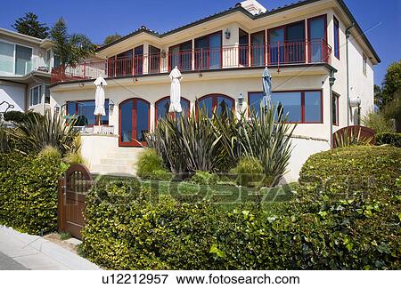 Stock Photo - Front exterior of California coastal home. Fotosearch