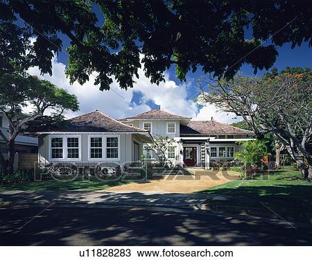 Stock Image - Front exterior of contemporary coastal home. Fotosearch