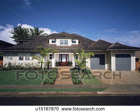 Stock Image - Front exterior of contemporary coastal home. Fotosearch