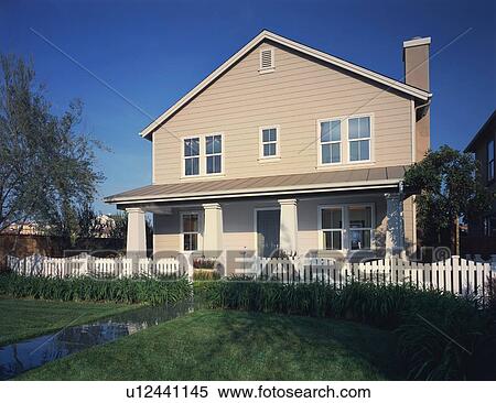 Stock Photography - Front exterior of country style home. Fotosearch