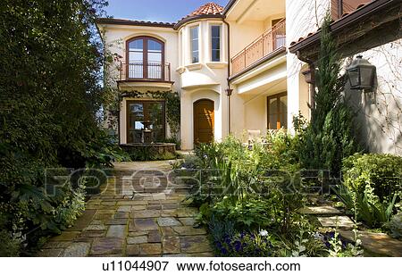 Front exterior of spanish home with fountain View Large Photo Image Stock Photo - Front exterior of spanish home with fountain. Fotosearch