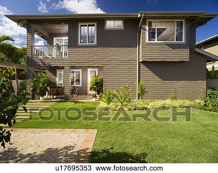 Rear exterior of traditional home View Large Photo Image Stock Image - Rear exterior of traditional home. Fotosearch