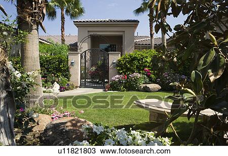 Stone bench in yard with garden View Large Photo Image Stock Image - Stone bench in yard with garden. Fotosearch