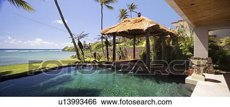 Swimming pool with jacuzzi and cabana View Large Photo Image Stock Photograph - Swimming pool with jacuzzi and cabana. Fotosearch
