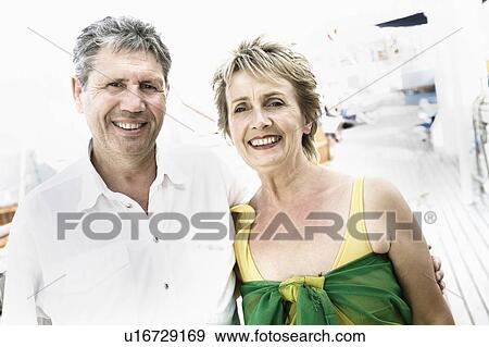 Stock Photo - Portrait of a senior man with a mature woman smiling. Fotosearch