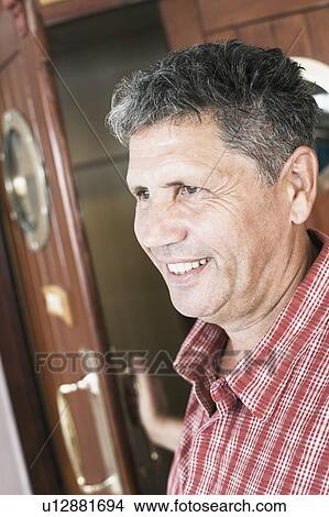 Picture - Close-up of a senior man smiling. Fotosearch
