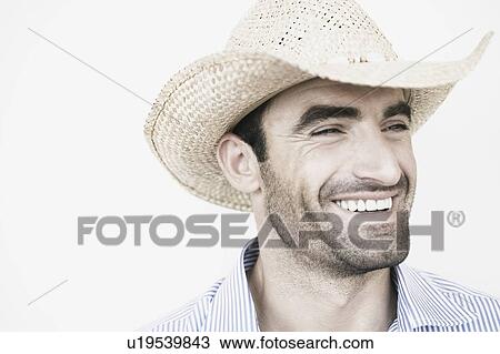 Close-up of a young man smiling View Large Photo Image Stock Image - Close-up of a young man smiling. Fotosearch