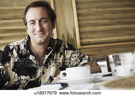 Portrait of a mid adult man smiling View Large Photo Image Stock Photo - Portrait of a mid adult man smiling. Fotosearch